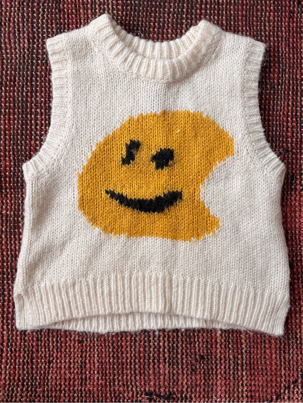Molo Kids Cream Knit Vest with Yellow Smiley Graphic